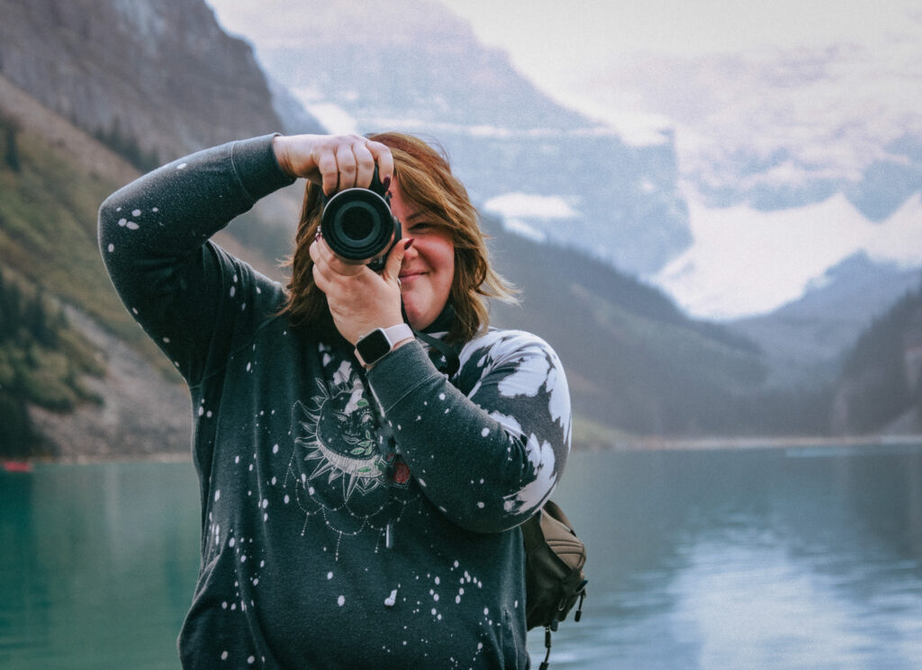elopement photographer taking photos at Lake Louise in Alberta Canada. 